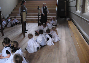 children having lesson in the Wilderspin gallery